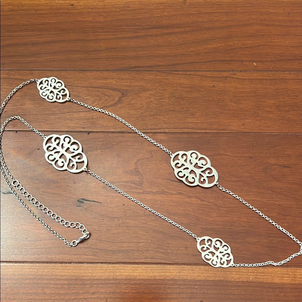 Elegant Silver Openwork Pendant Necklace